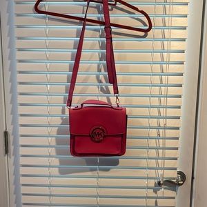 Hot pink Michael Kors crossbody bag